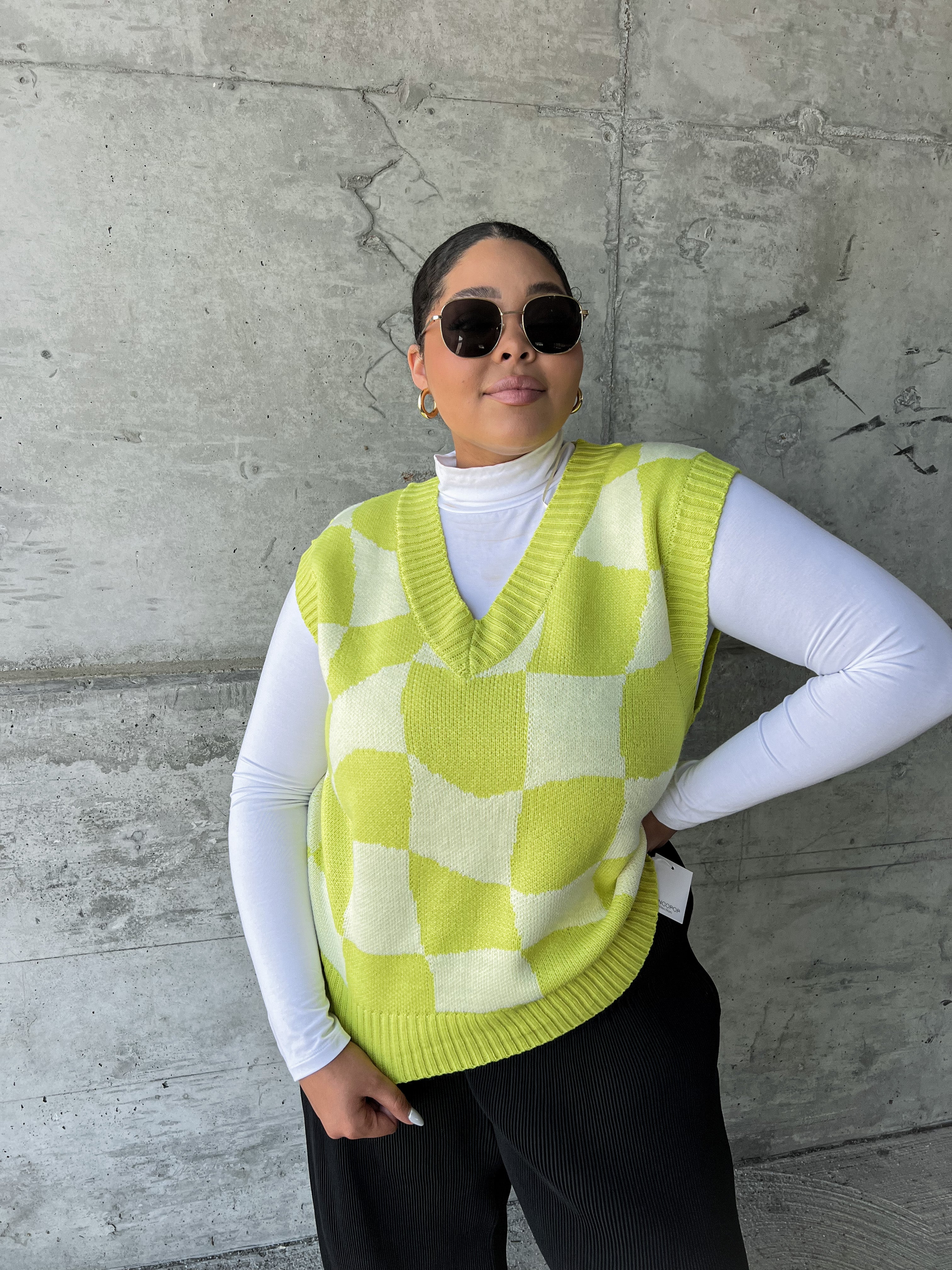 About It Neon Checkered Sweater Vest